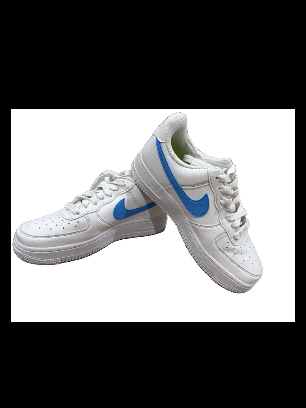 Nike White Low-Top Sneakers with Blue Swoosh Accent